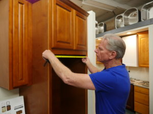 measuring new cabinets for kitchen remodel