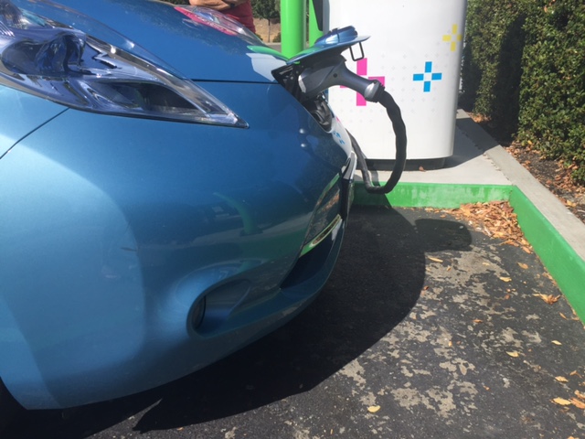 electric vehicle at charging station